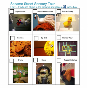 Sesame Street Scavenger Hunt that includes a grid of nine pictures that includes photos and labels of Super Grover, Rubber Duckie, and Puppet Materials with boxes for visitors to check off during their visit
