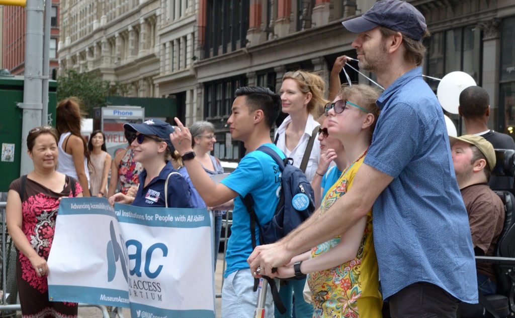 Image: Members of the Museum Access Consortium march in New York City's Disability Pride Parade in 2016. 