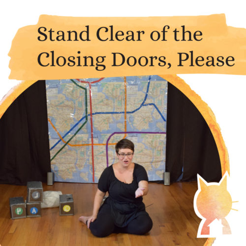 A performer dressed in black sits on the floor in front of a giant subway map. In black text above her are the words "Stand Clear of the Closing Doors, Please".